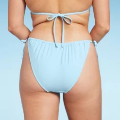 Women's Side-Tie Low-Rise High Leg Adjustable Bikini Bottom - Wild Fable™ Blue 10 Women's Side-Tie Low-Rise High Leg Adjustable Bikini Bottom - Wild Fable™ Blue -Wild Fable Store GUEST 924af3bc 7a86 4a95 8319 2249382b46e6