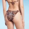 Women's Cut Out Strappy Side-Tie Extra High Leg Extra Cheeky Bikini Bottom - Wild Fable™ Multi Animal Print 1 Women's Cut Out Strappy Side-Tie Extra High Leg Extra Cheeky Bikini Bottom - Wild Fable™ Multi Animal Print -Wild Fable Store GUEST df7b90b2 b293 4ae6 bf7f 49eb22759dbe